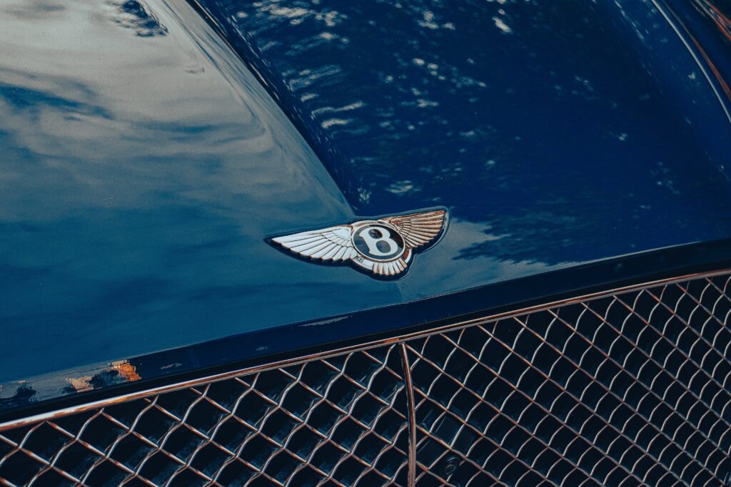 a front of a bentley with its logo