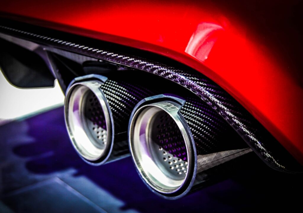 an exhaust on a red vehicle