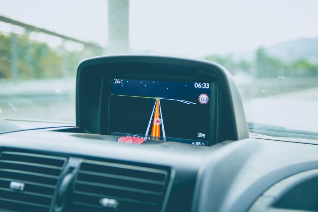 a built in sat nav in a car showing directions