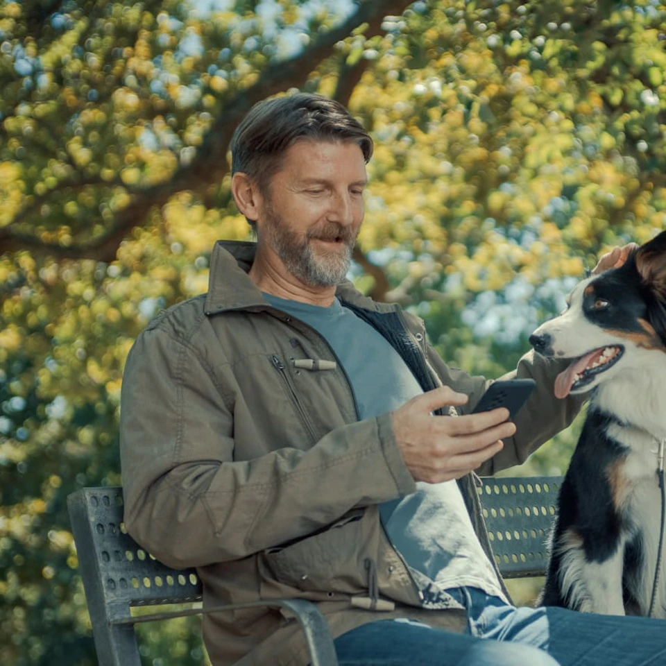 man with dog satisfied after selling his van