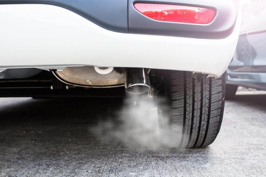 car exhaust with fumes coming out of it