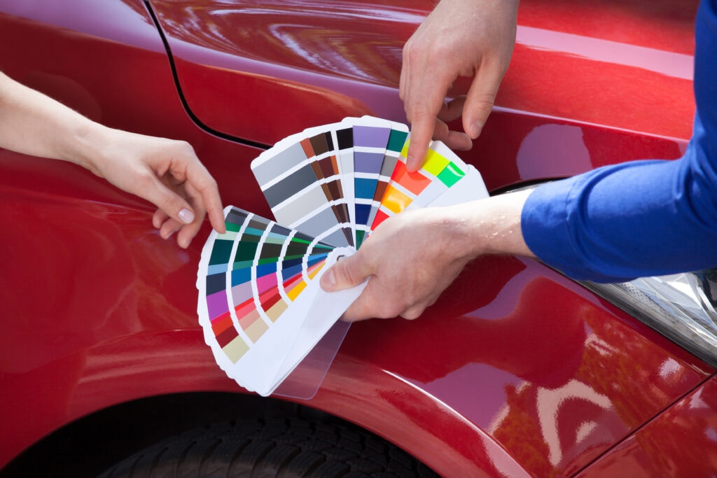 mechanic showing customer colours