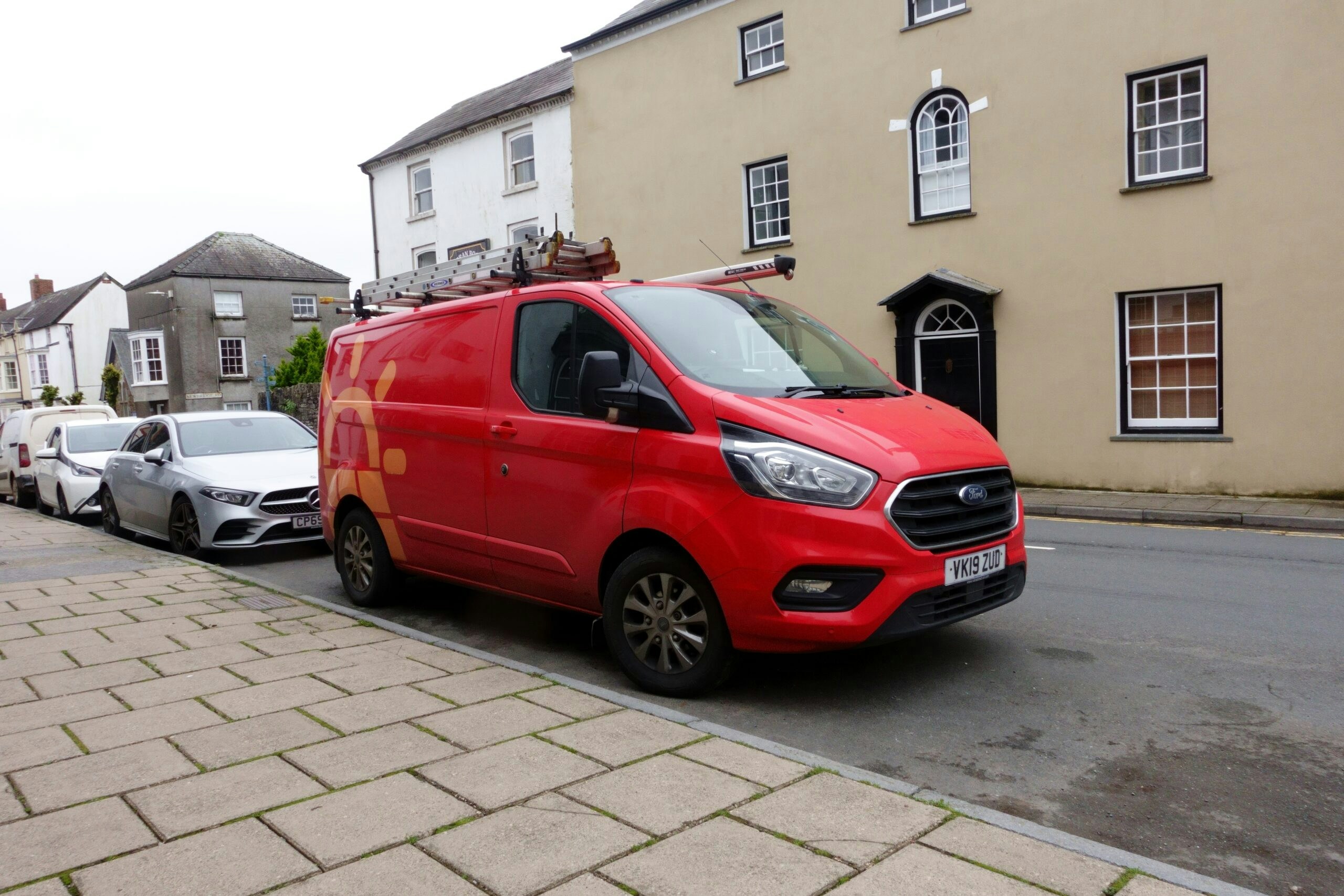 red van parked up