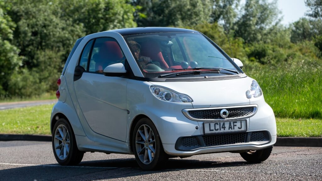 an older version on the smart car on the road