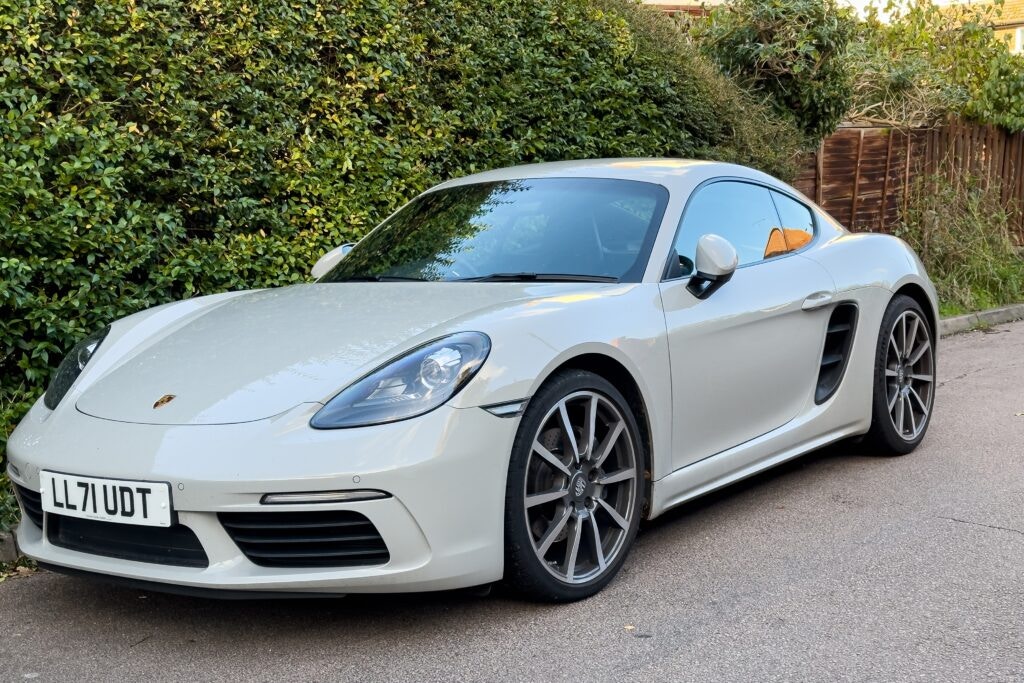 white porsche cayman