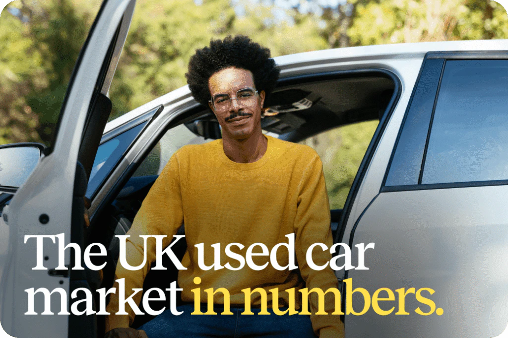 A man sat in a silver car - titled 'The used car market in numbers'